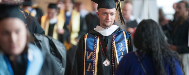 Image of student veteran at the beginning of commencement ceremonies